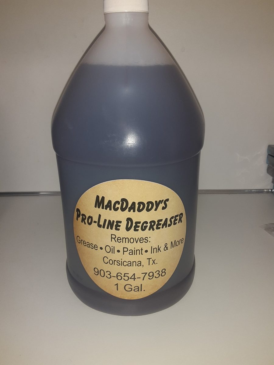 Jug of MacDaddy's Pro-Line Degreaser — removes grease, oil, paint, ink and more